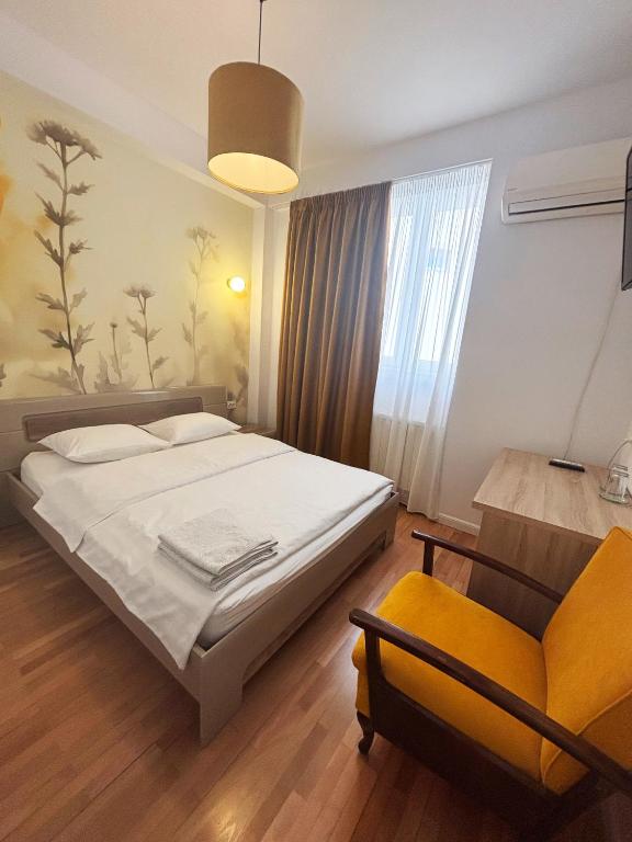 Postel nebo postele na pokoji v ubytování Vila A&B