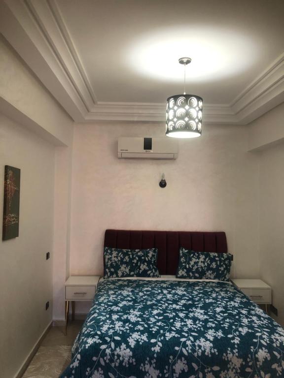 Ένα ή περισσότερα κρεβάτια σε δωμάτιο στο - Résidence Babylone Y - 1 Bedroom Appartement