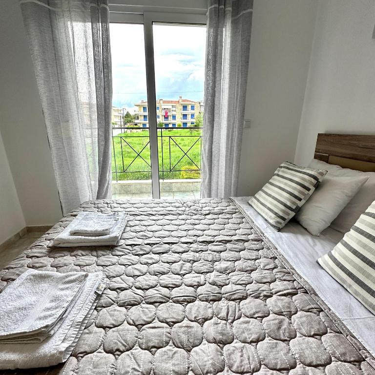 Postel nebo postele na pokoji v ubytování R&T Apartments