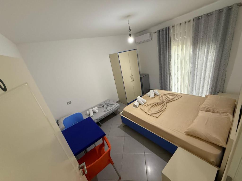 Postel nebo postele na pokoji v ubytování Namelijan's Hotel