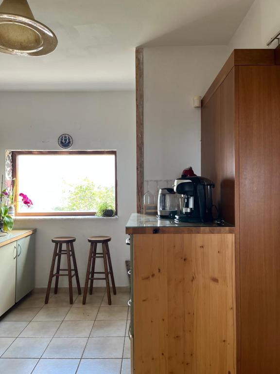 A kitchen or kitchenette at Aletraki -Off-Grid Retreat Above Heraklion, Peaceful Views
