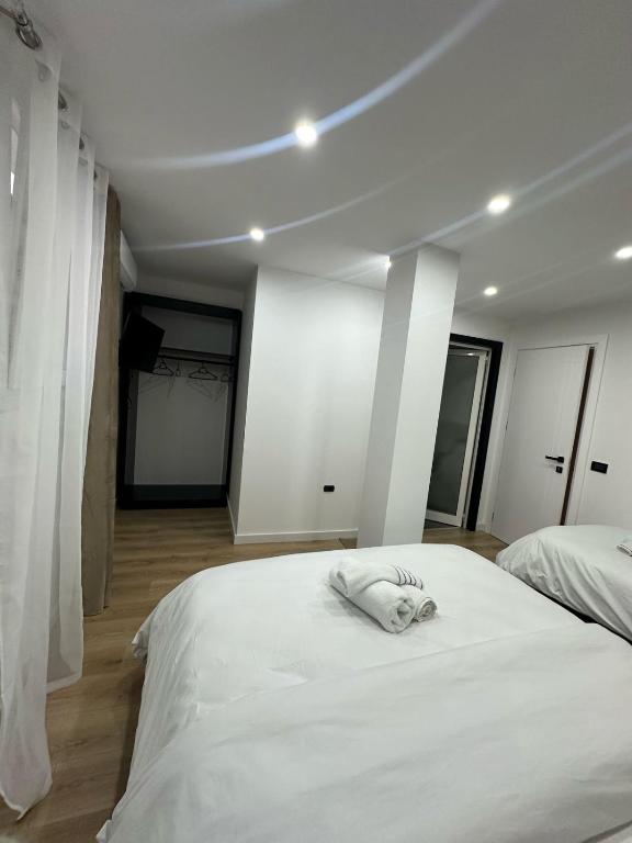 Postel nebo postele na pokoji v ubytování Luz de Sol Rooms
