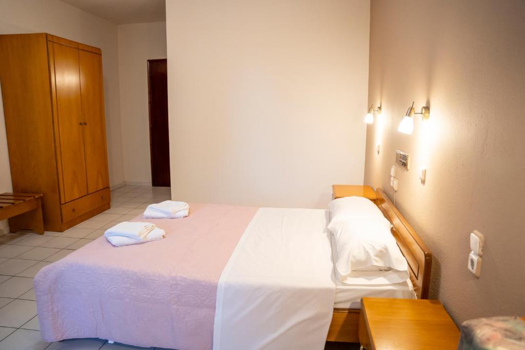 Postel nebo postele na pokoji v ubytování Pineas