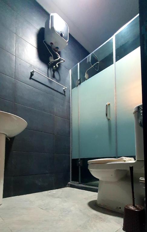 Koupelna v ubytování Dantis Apartments Magodo