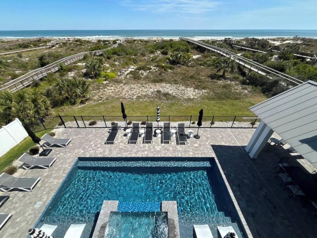 Image showcasing Enchanting Beachfront House with Luxury Pool & Hot Tub and Direct ...
