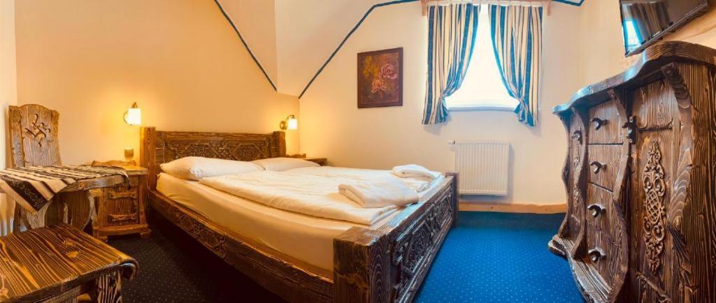 Postel nebo postele na pokoji v ubytování Pension Aja
