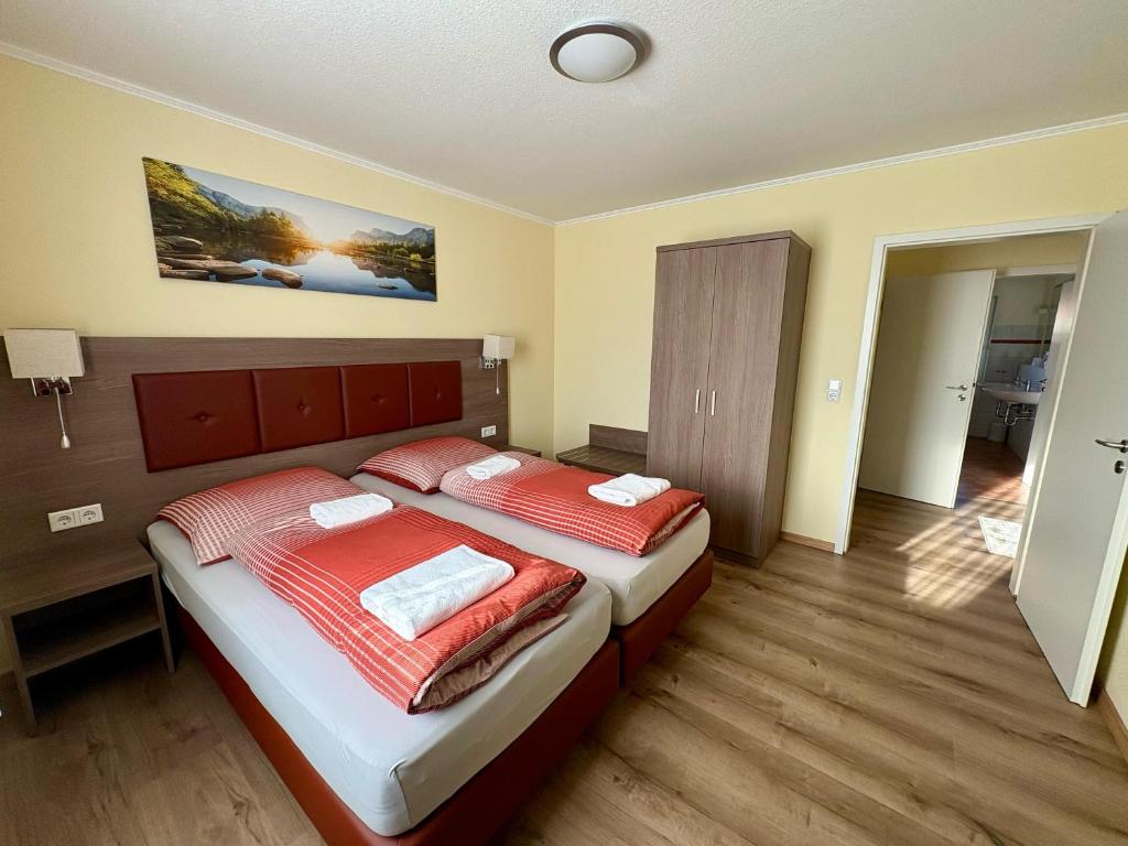 Postel nebo postele na pokoji v ubytování Ellen Hotel