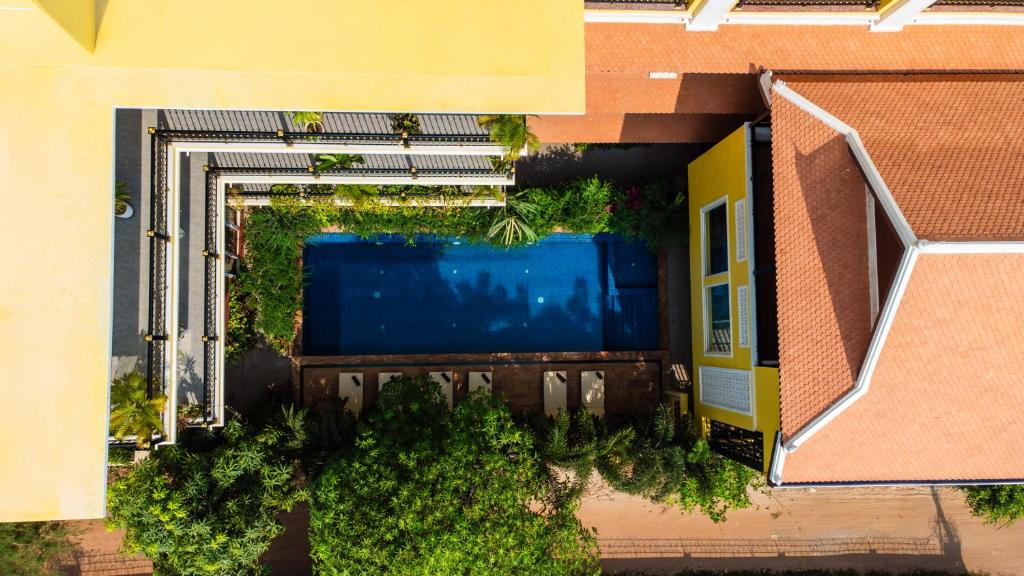 an overhead view of a building with a swimming pool at Sunflower Angkor Boutique Hotel in Siem Reap