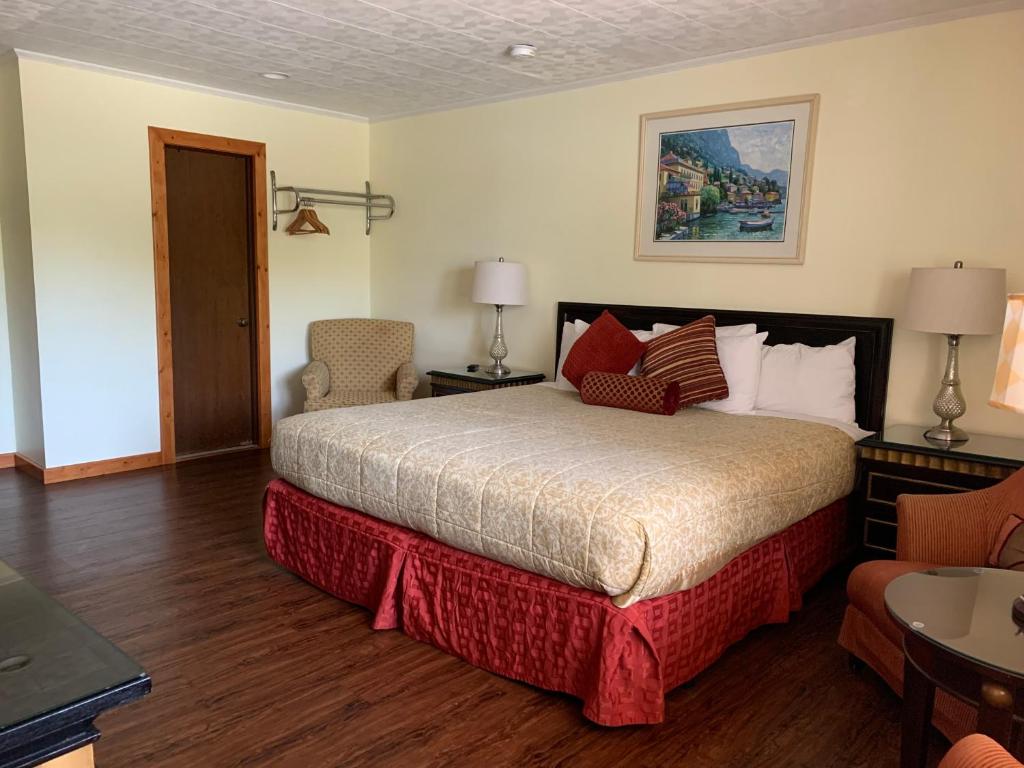 Postel nebo postele na pokoji v ubytování Cape Pines Motel