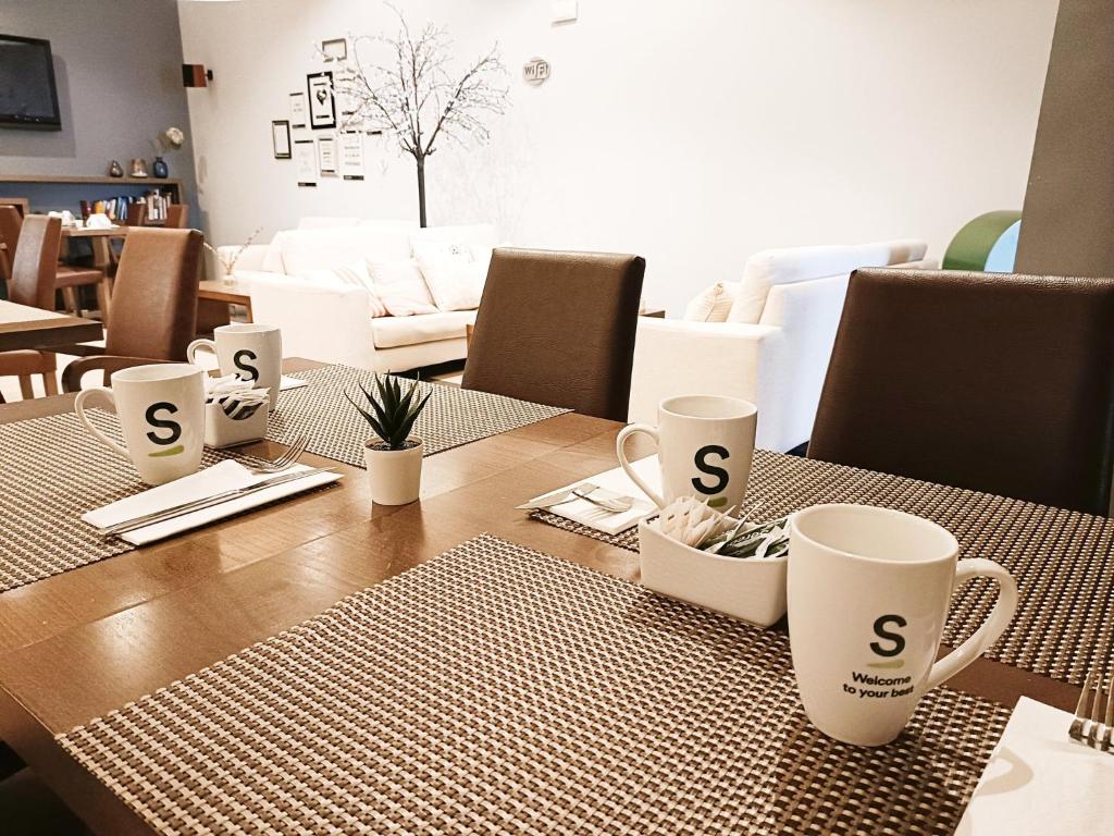 Posezení v ubytování Hotel Sercotel Portales
