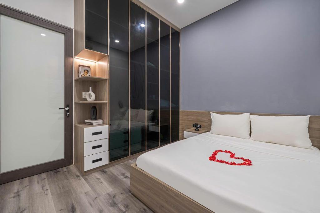 Ένα ή περισσότερα κρεβάτια σε δωμάτιο στο Villa Hội An Large