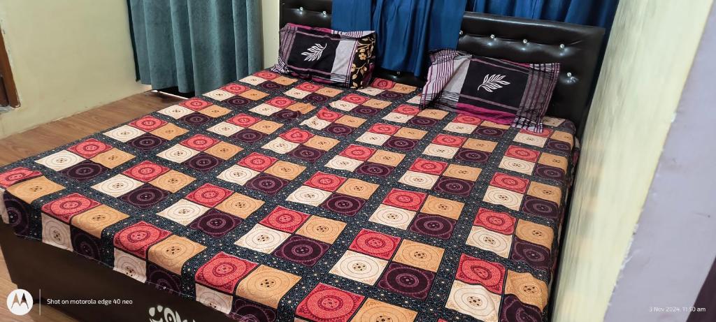 Postel nebo postele na pokoji v ubytování Maa jamwanti homestay