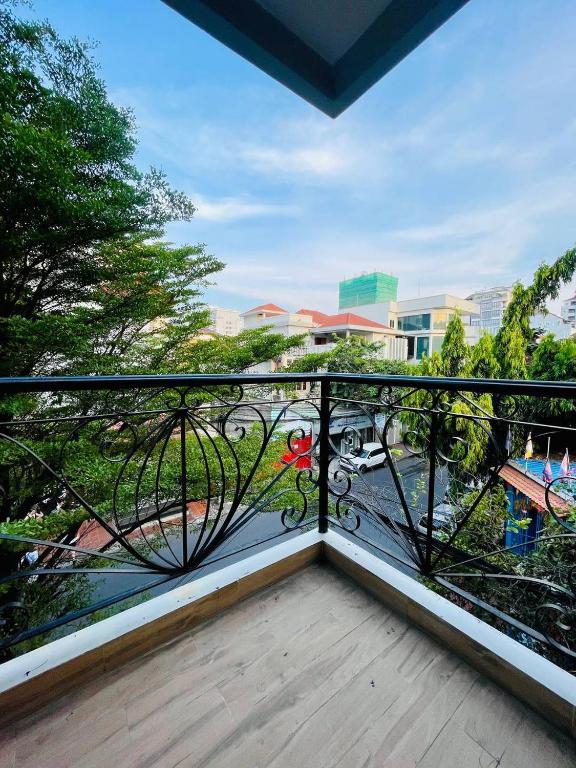 a balcony with a view of a city at DL Homestay in Phnom Penh