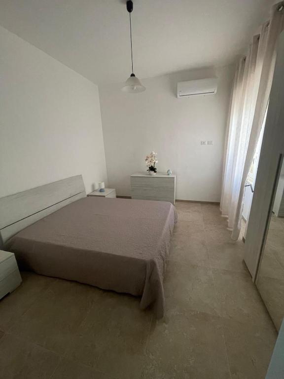 Postel nebo postele na pokoji v ubytování Casa vacanze Salento Sant Isidoro