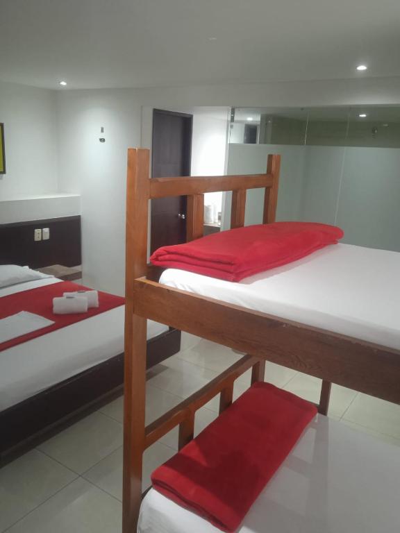 Postel nebo postele na pokoji v ubytování Hotel Romanza