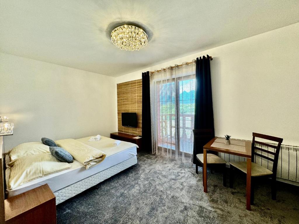 Postel nebo postele na pokoji v ubytování Tatragolf Resort Apartment 204 Veľká Lomnica