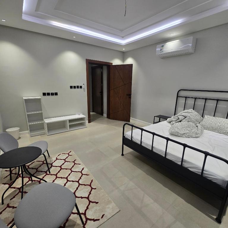 Ένα ή περισσότερα κρεβάτια σε δωμάτιο στο سعه 101