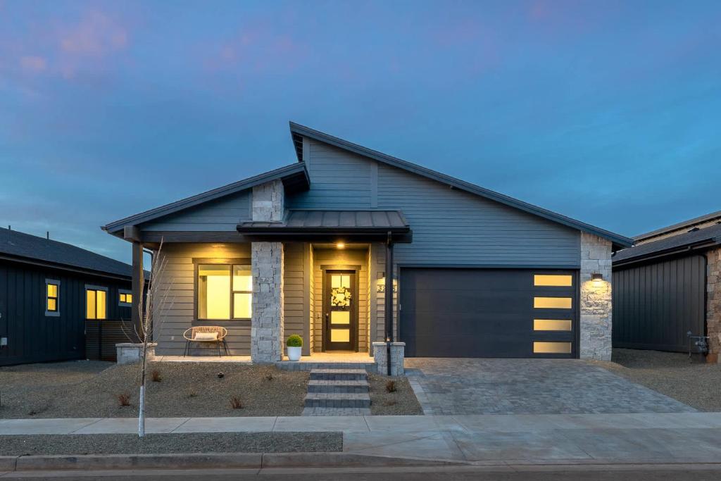a house with a garage at Adora in the Pines with Axe Throwing in Flagstaff