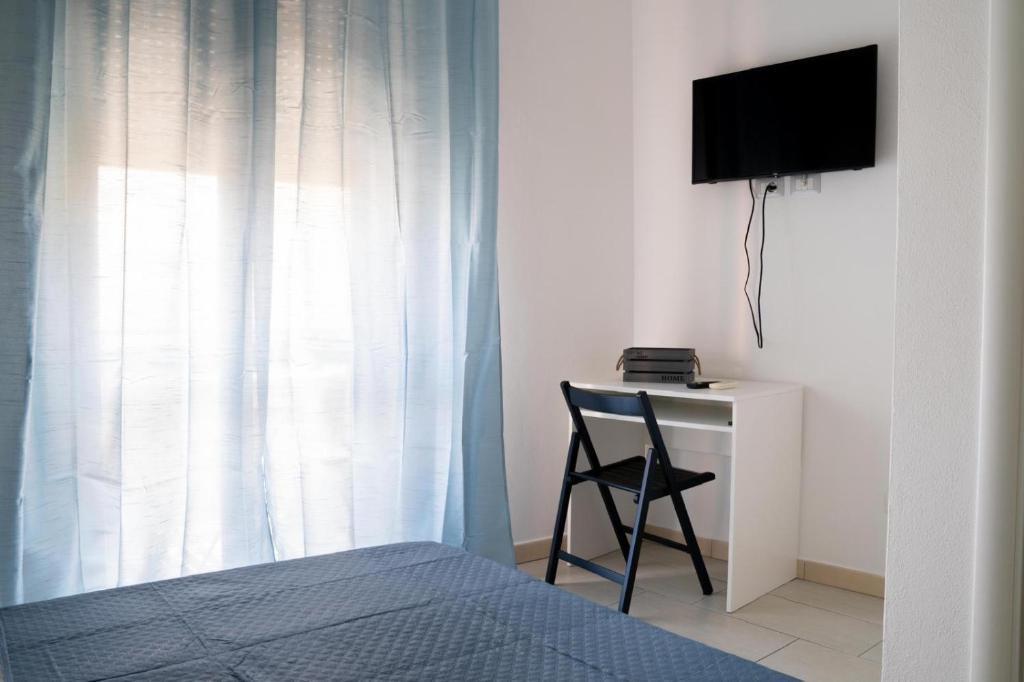 TV a/nebo společenská místnost v ubytování Eulalia Bnb Alghero