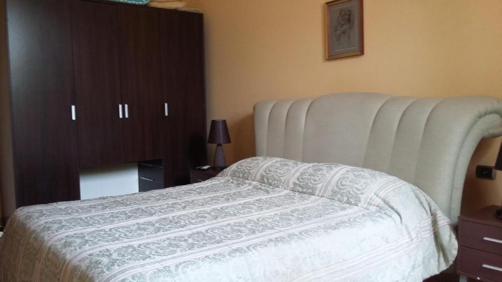 Postel nebo postele na pokoji v ubytování B&B Castellazzo
