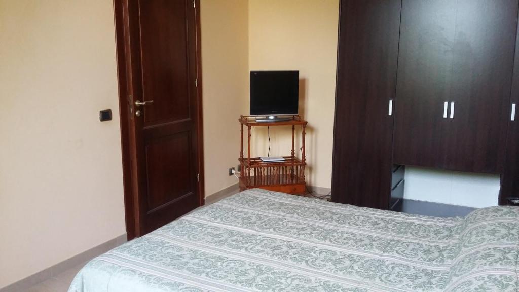 Postel nebo postele na pokoji v ubytování B&B Castellazzo
