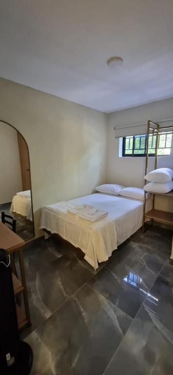 Postel nebo postele na pokoji v ubytování Hotel RUTA365