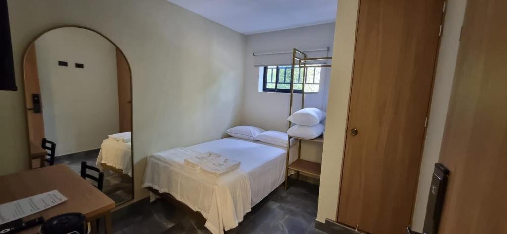 Postel nebo postele na pokoji v ubytování Hotel RUTA365