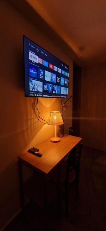 TV a/nebo společenská místnost v ubytování Hotel RUTA365