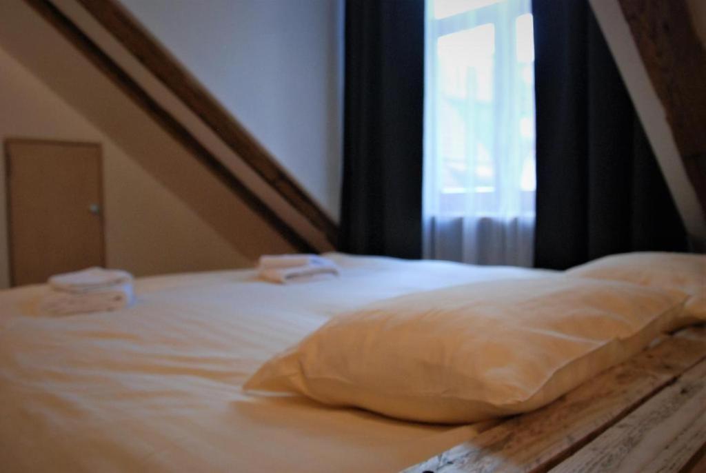 Postel nebo postele na pokoji v ubytování Amber Private Rooms