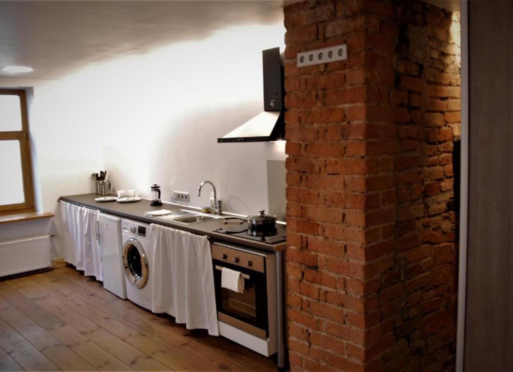 Kuchyň nebo kuchyňský kout v ubytování Amber Private Rooms