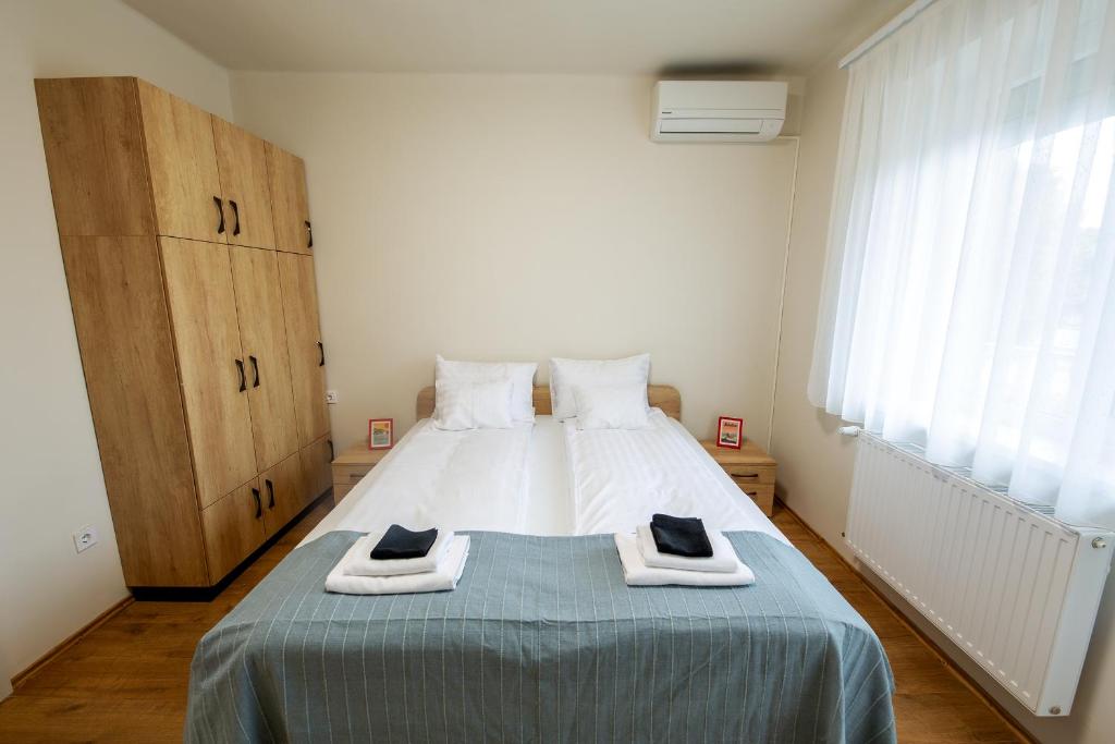 Postel nebo postele na pokoji v ubytování Mazurek Balatonboglar