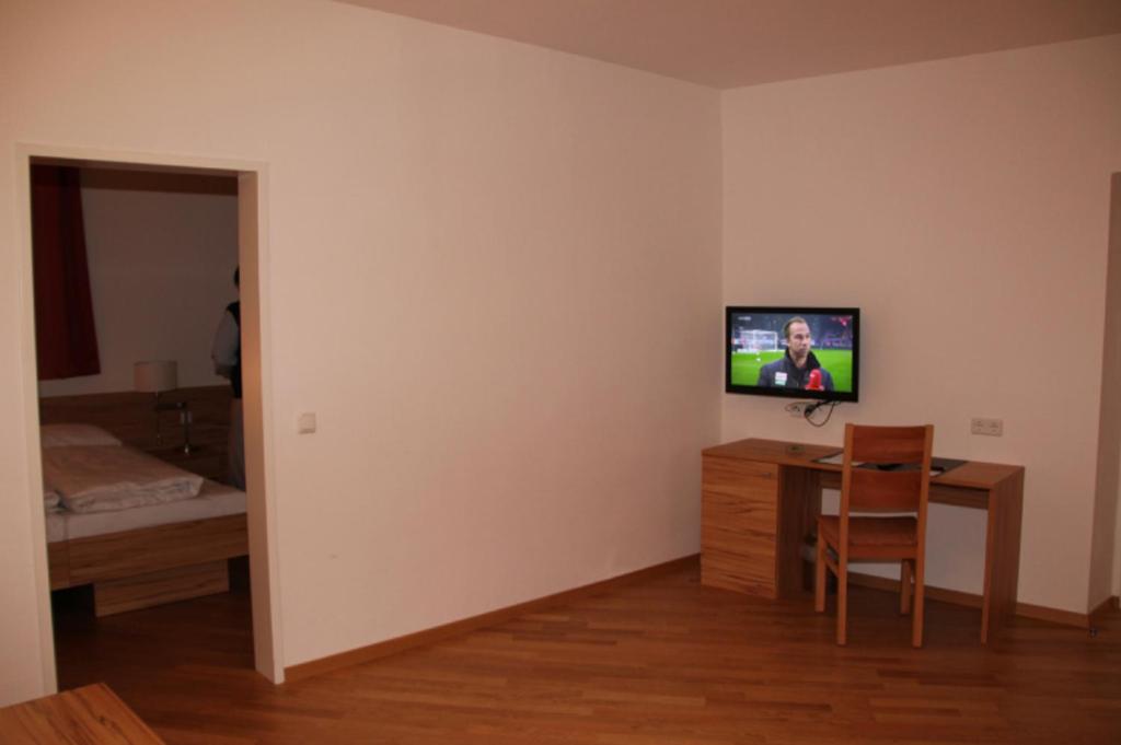 TV a/nebo společenská místnost v ubytování Zum Shambhala