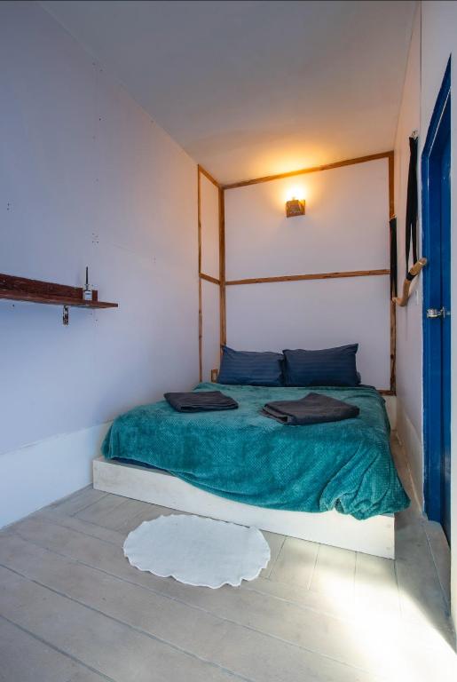 Postel nebo postele na pokoji v ubytování La Due Thulusdhoo