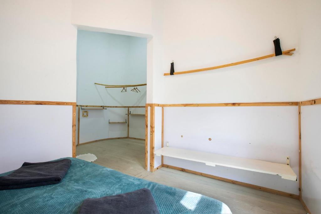 Postel nebo postele na pokoji v ubytování La Due Thulusdhoo