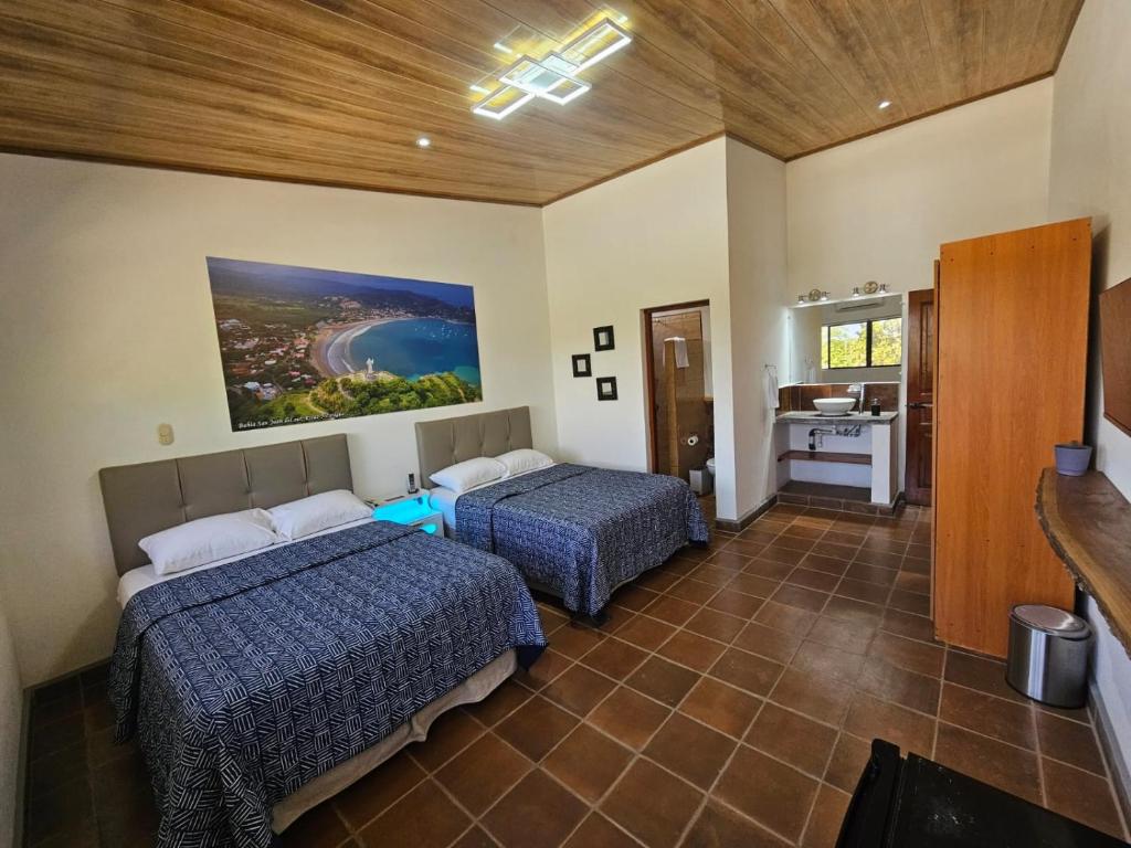 Ένα ή περισσότερα κρεβάτια σε δωμάτιο στο Nica Valley