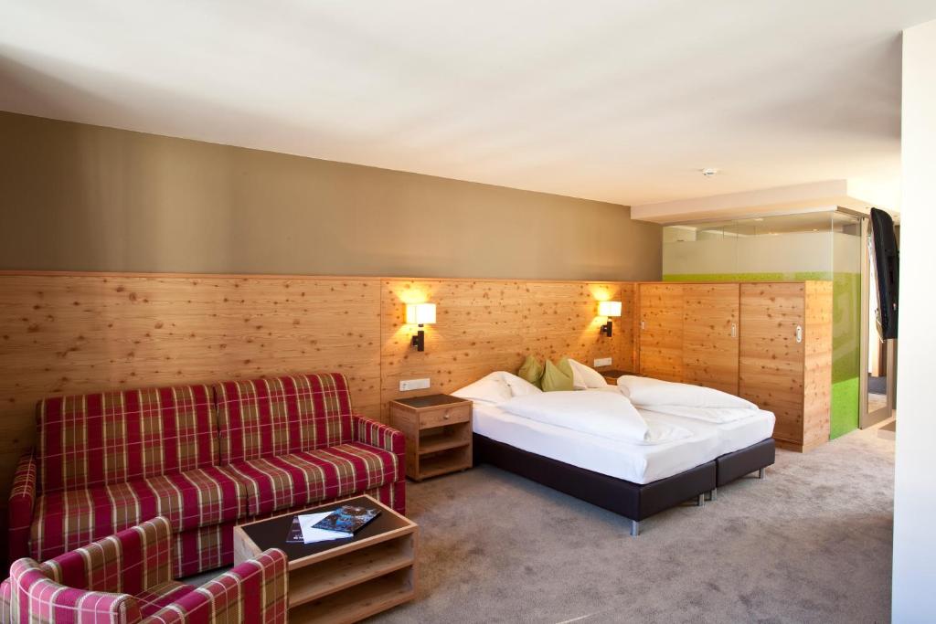 Postel nebo postele na pokoji v ubytování Hotel Bäckelar Wirt Superior