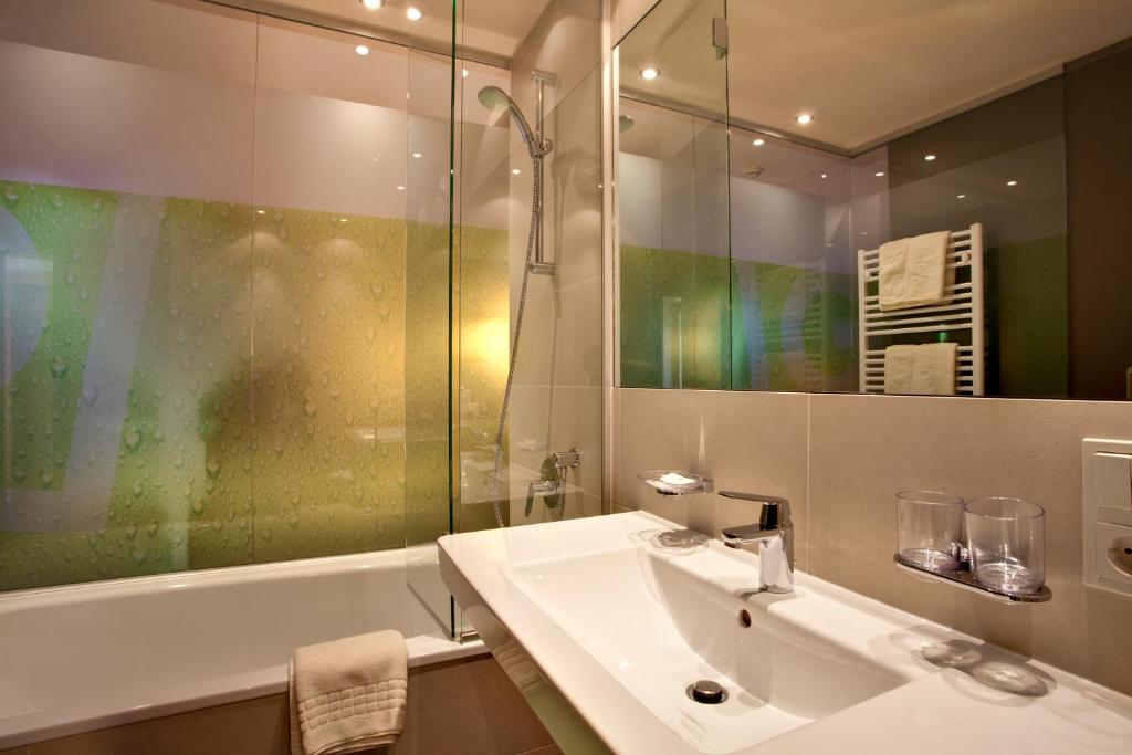 Koupelna v ubytování Hotel Bäckelar Wirt Superior