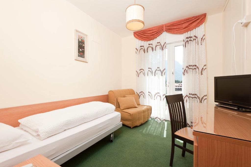 TV a/nebo společenská místnost v ubytování Hotel Lux