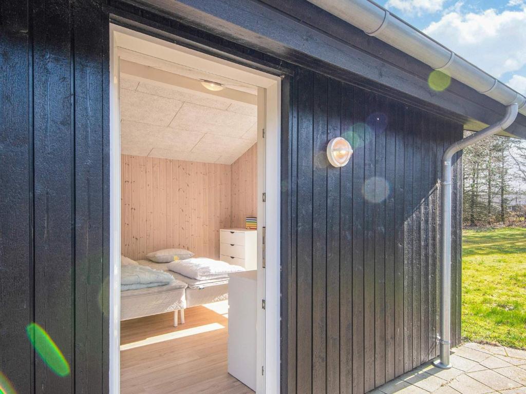 Postel nebo postele na pokoji v ubytování Holiday home Oksbøl LXXXI