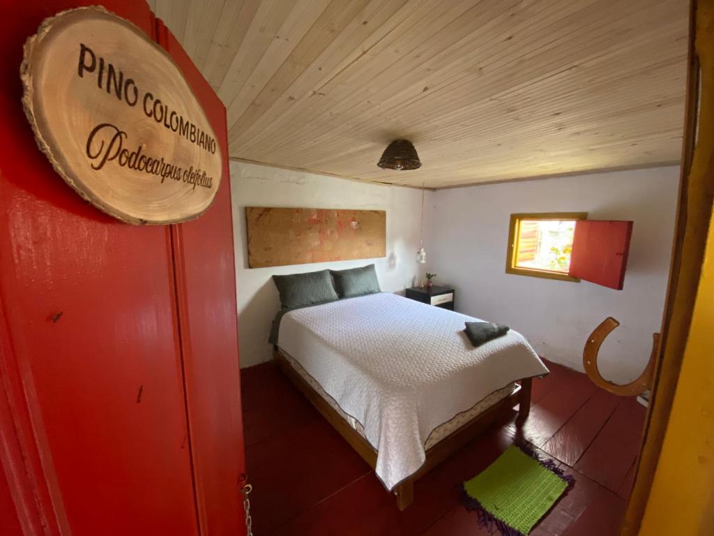 Rúm í herbergi á El Hostal del Abuelo