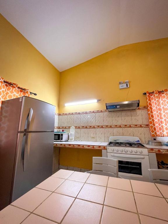 Kuchyň nebo kuchyňský kout v ubytování Cabañas El Valle