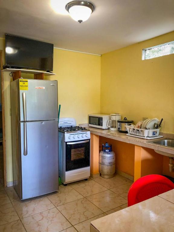 Kuchyň nebo kuchyňský kout v ubytování Cabañas El Valle