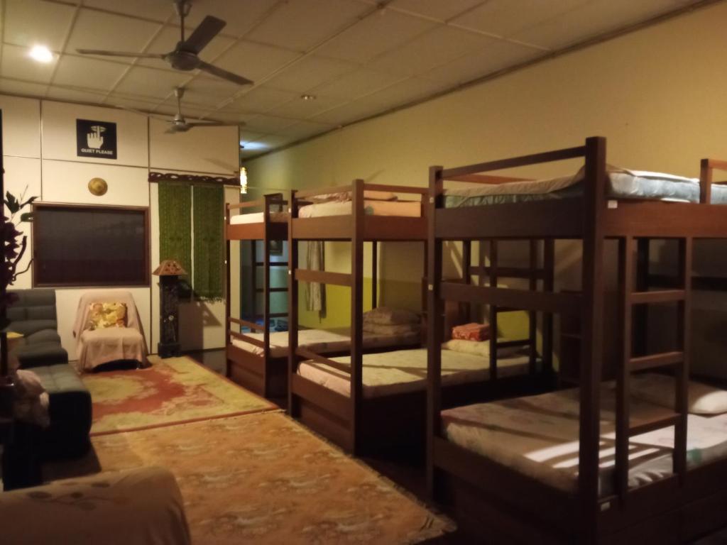 Postel nebo postele na pokoji v ubytování Marco Polo Guest House