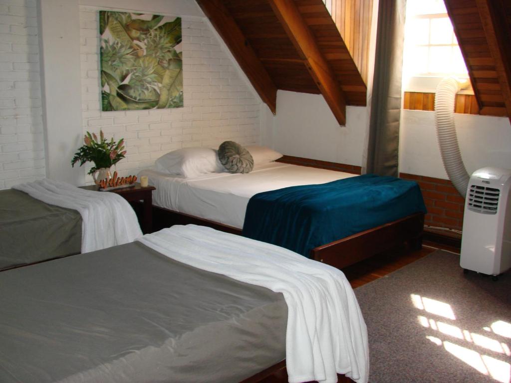 Postel nebo postele na pokoji v ubytování Private rooms, 10 min from SJO Airport
