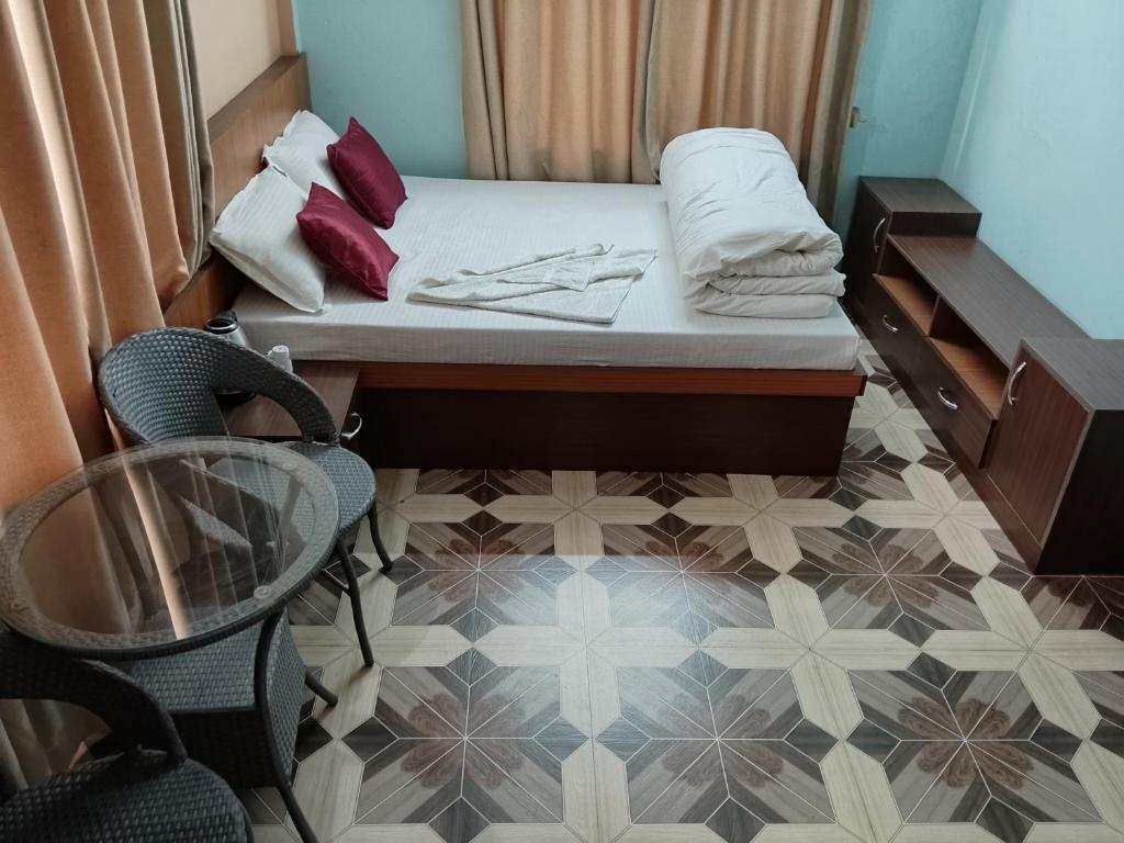 Postel nebo postele na pokoji v ubytování Royal Orbit Resort Pvt Ltd Pokhara