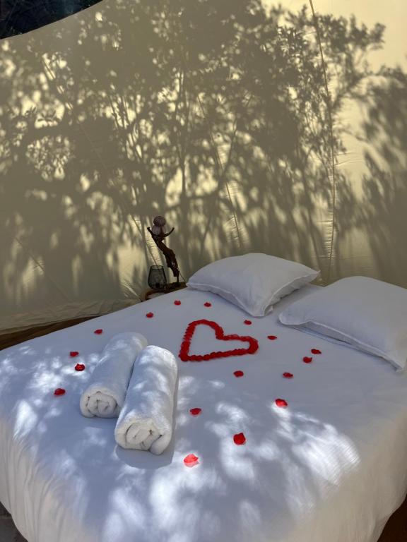 Postel nebo postele na pokoji v ubytování Bulle du Fangu