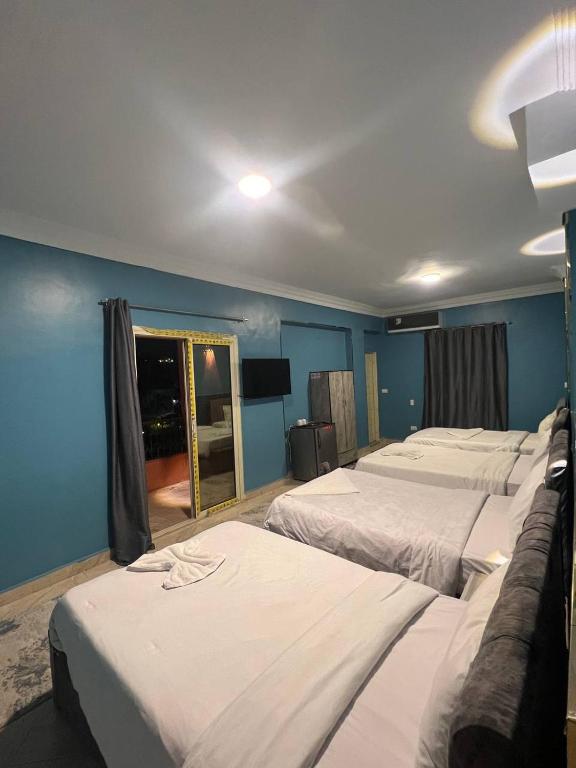 Postel nebo postele na pokoji v ubytování Beko pyramids inn