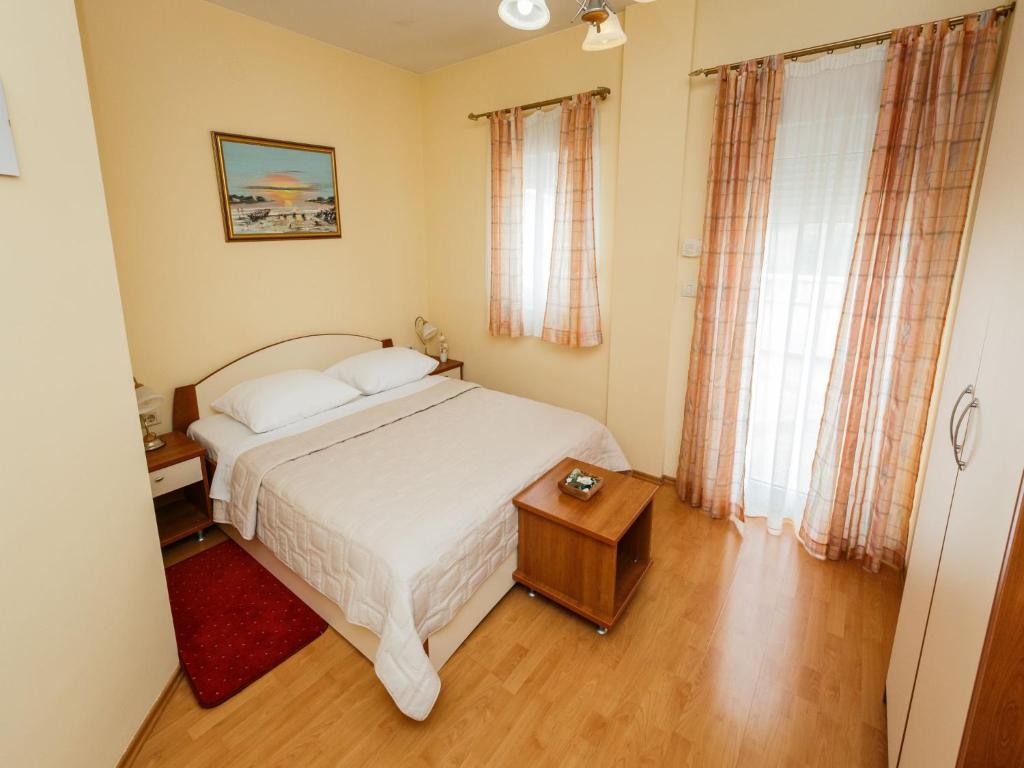 Letto o letti in una camera di Hotel Adria