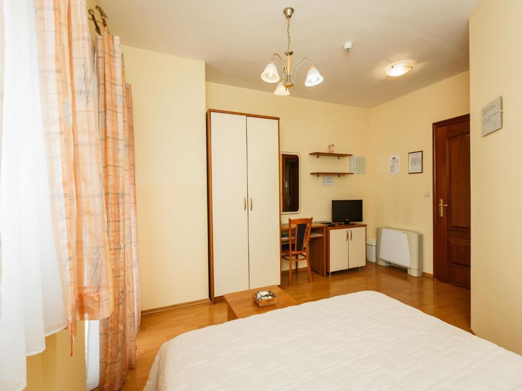 Letto o letti in una camera di Hotel Adria