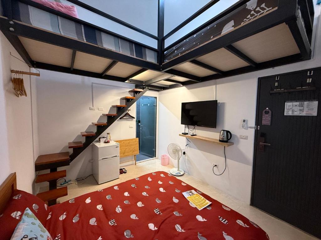 Postel nebo postele na pokoji v ubytování Jinguann B&B
